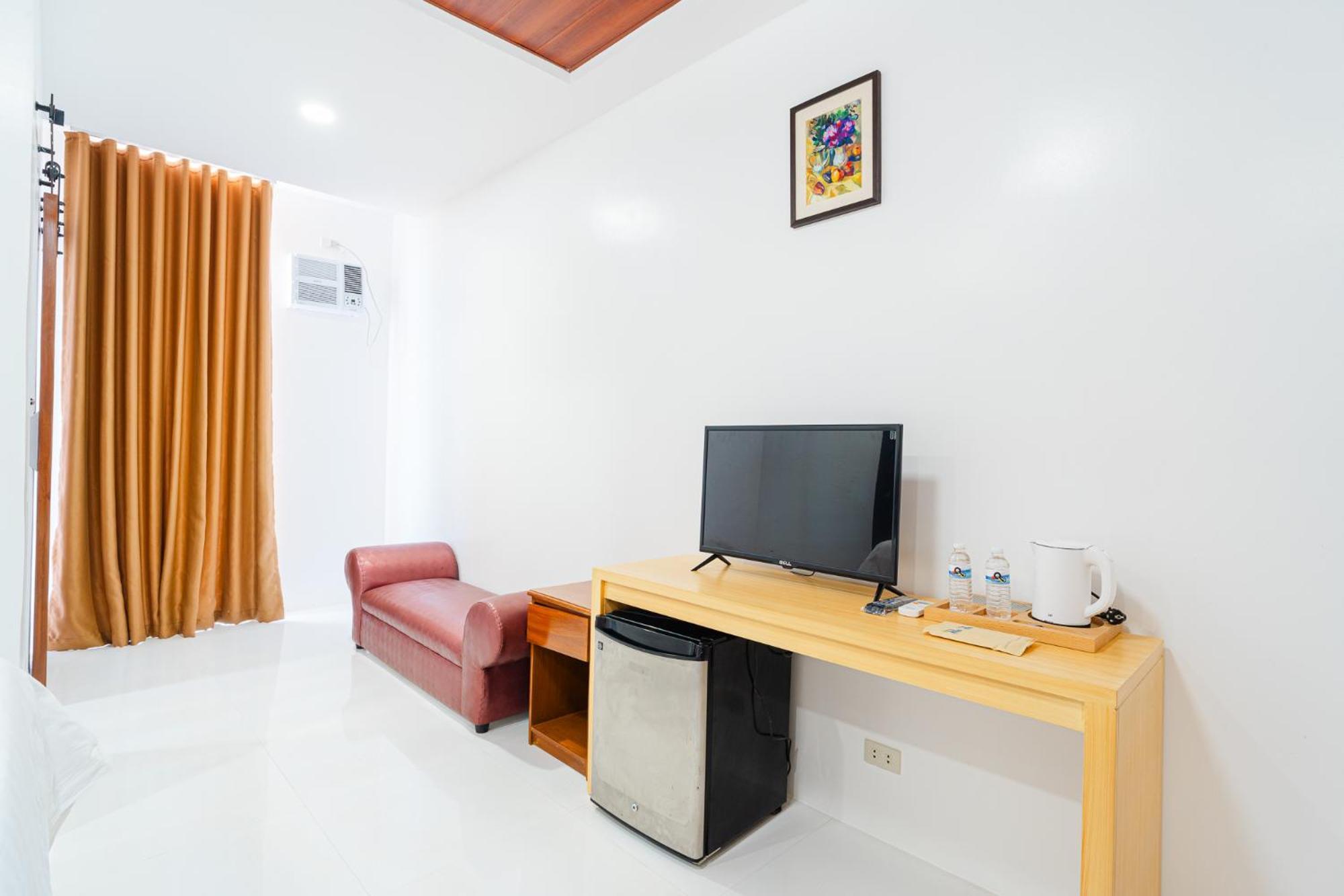 Q Beach Resort Cabangan Bilik gambar